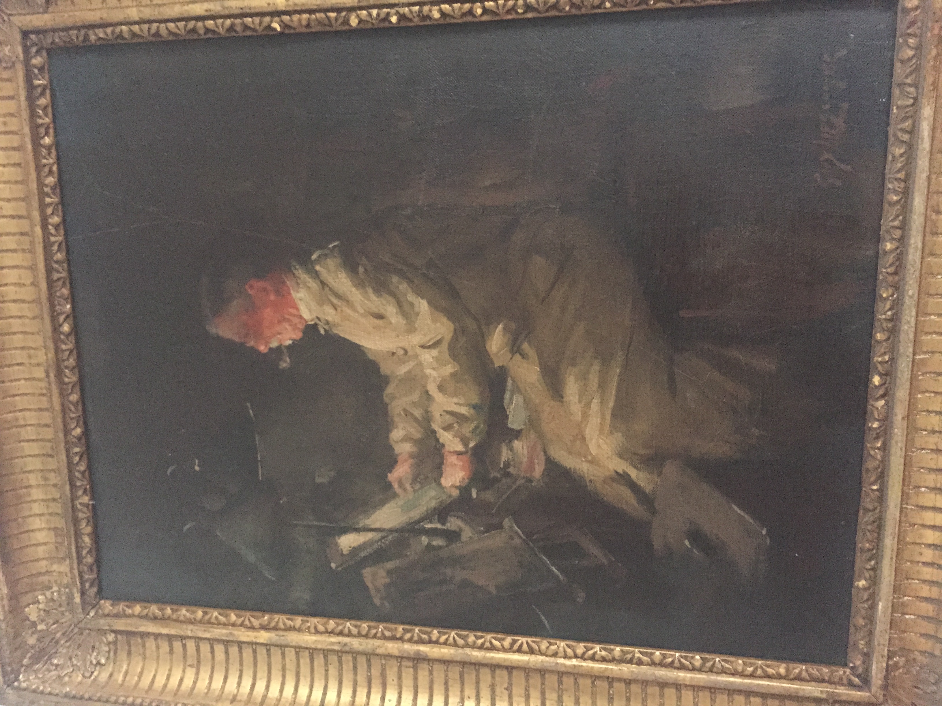 A lamplit oil painting of a figure at work, by the painter Wilkie, from Simon Britton's family